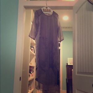 Cocktail dress with sheer overlay